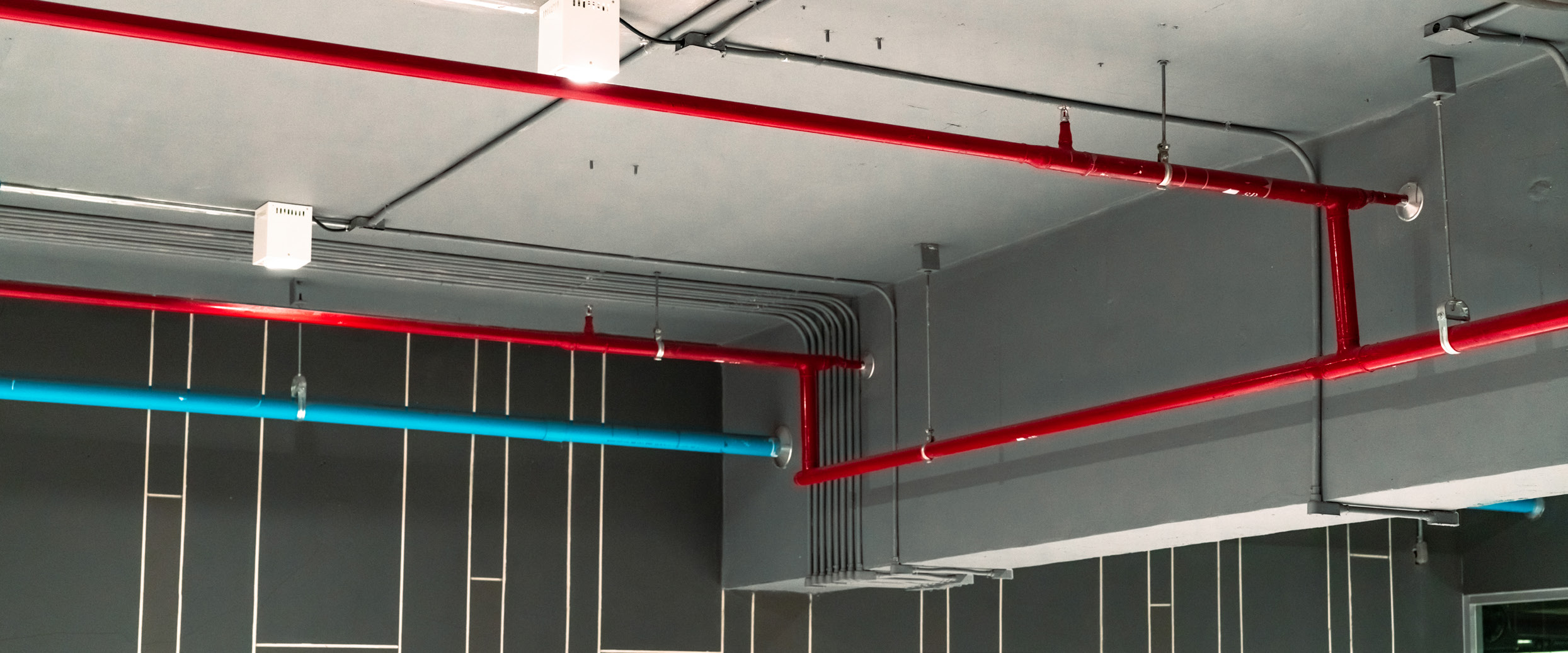 Installed fire protection piping in a completed facility